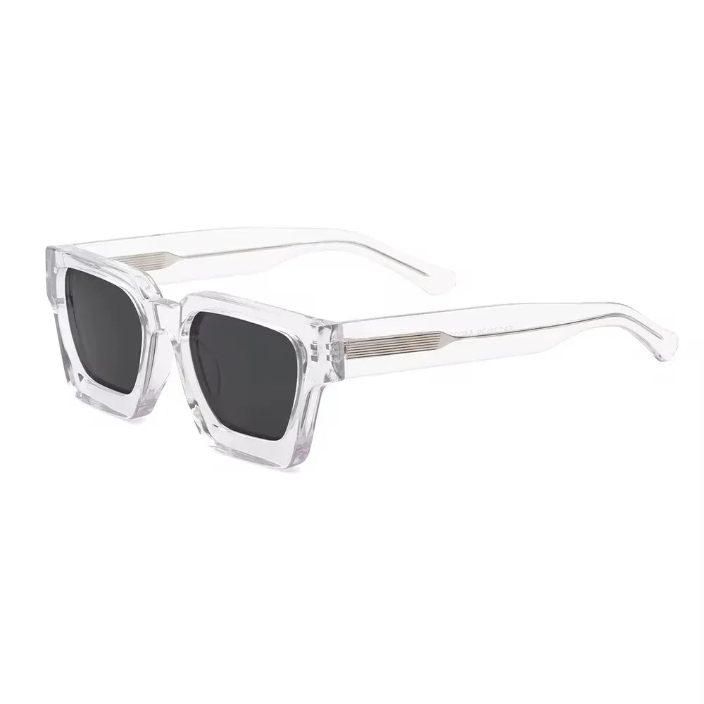 The Vision Junkie Gotti sunglasses with clear transparent frames and dark lenses.