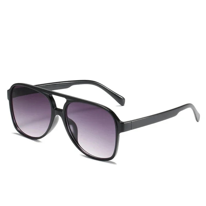 The Vision Junkie Blake sunglasses with black frames and purple gradient lenses