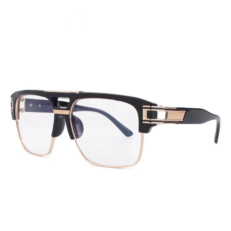 The Vision Junkie Jay eyewear featuring black and gold metal frames with clear lenses.