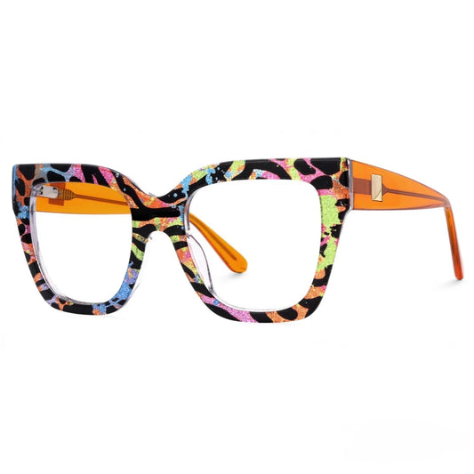 The Vision Junkie Isla eyewear featuring bold, colorful animal print frames with orange temples.